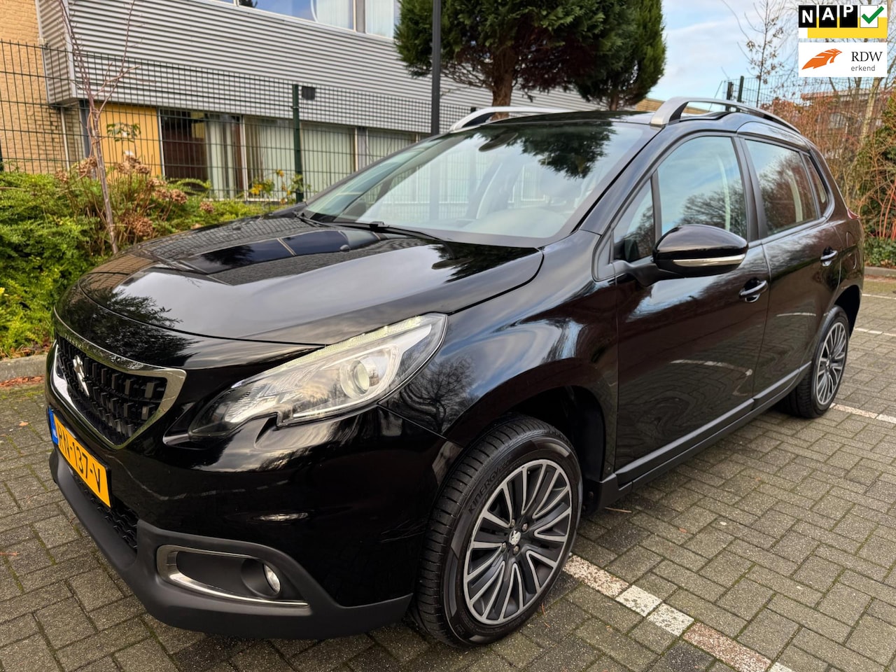 Peugeot 2008 - 1.2 PureTech Blue Lion / Pano'dak / Navi / Apple Carplay / PDC - AutoWereld.nl