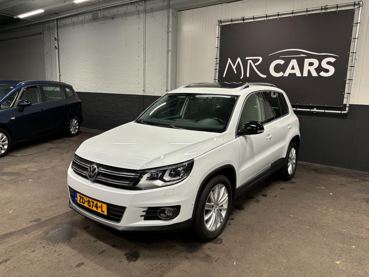 Volkswagen Tiguan - 1.4 TSI R-Line Edition Leder/Navi/Camera - AutoWereld.nl