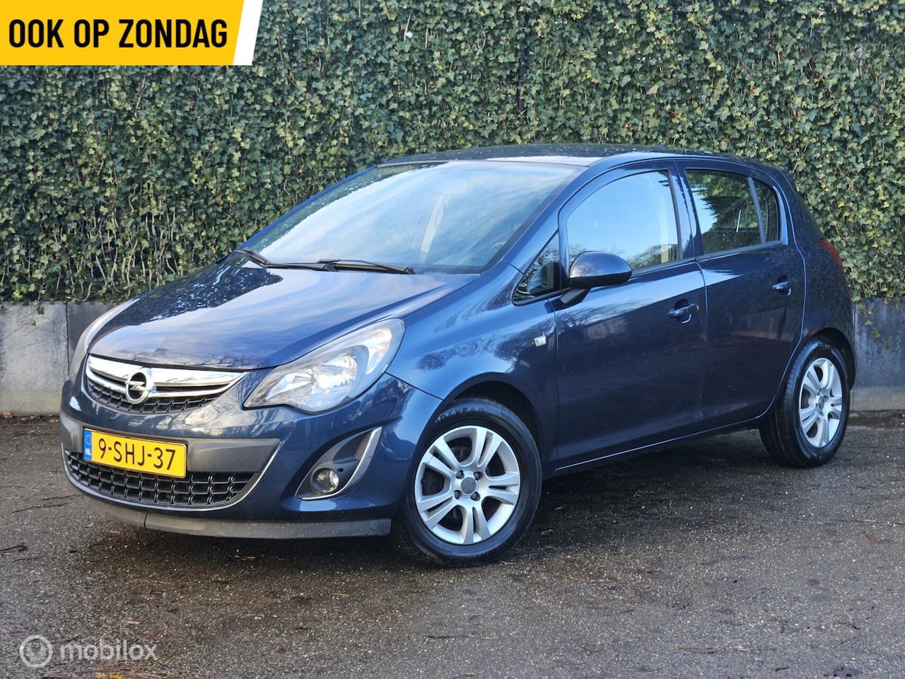 Opel Corsa - 1.4 5-Deurs | Airco | Navi | LMV - AutoWereld.nl