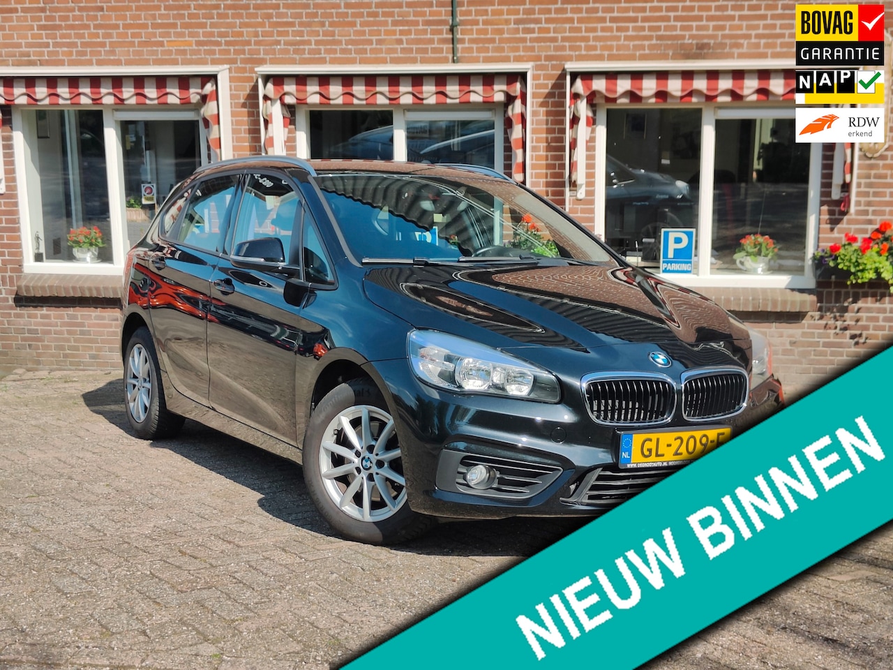 BMW 2-serie Active Tourer - 218i Essential Clima Cruise Navi PDC - RIJKLAAR - - AutoWereld.nl