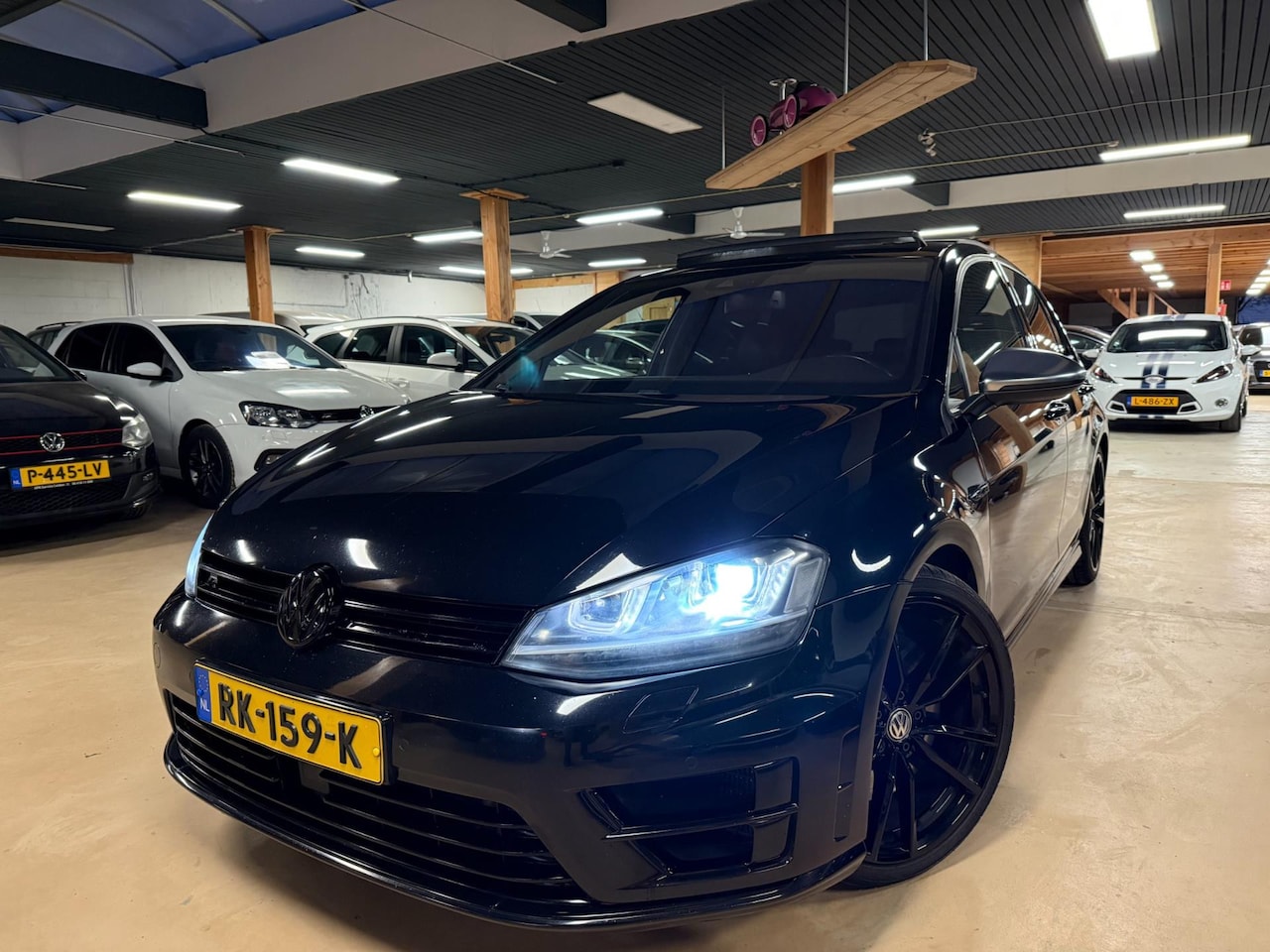 Volkswagen Golf - 2.0 TSI R 4Motion 382PK Pano Airco Lane Assist Cruise Control - AutoWereld.nl