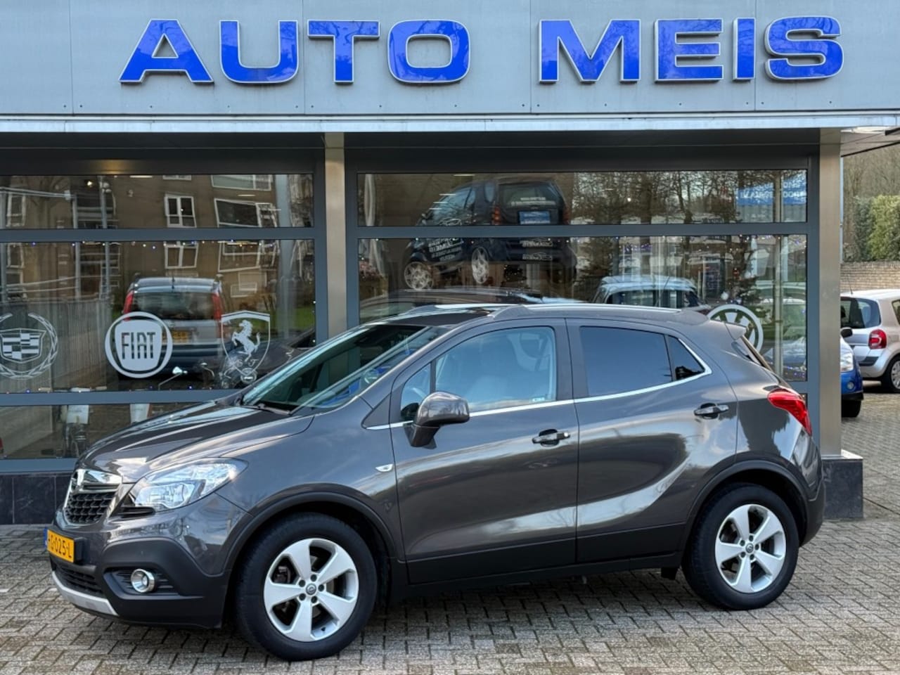 Opel Mokka - 1.4 T Cosmo Schuifdak Xenon Leder Navi PDC V+A Stuur en Stoelverw - AutoWereld.nl