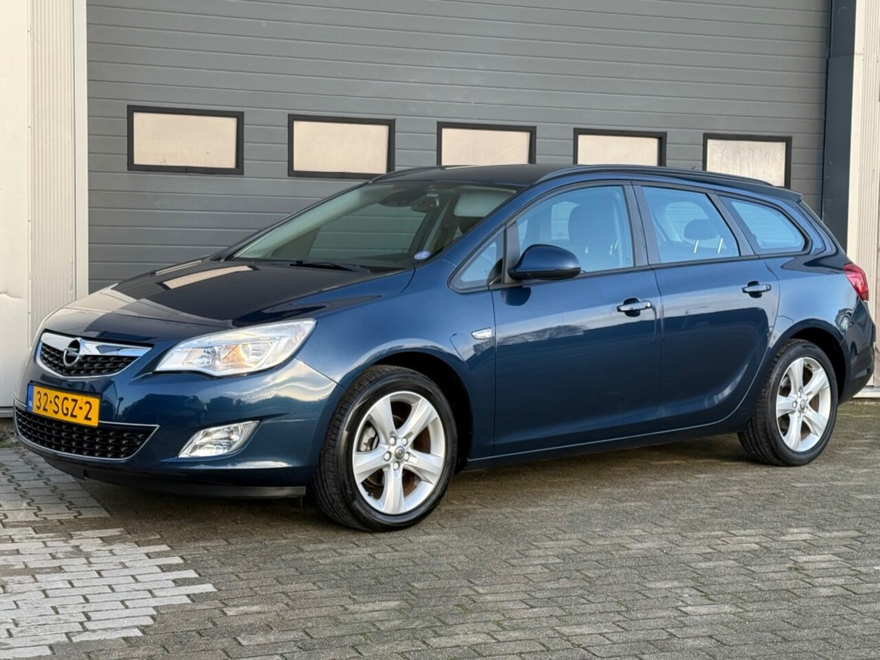 Opel Astra - 1.4 Turbo 140PK Edition Airco Navi Trekhaak NL-auto! - AutoWereld.nl