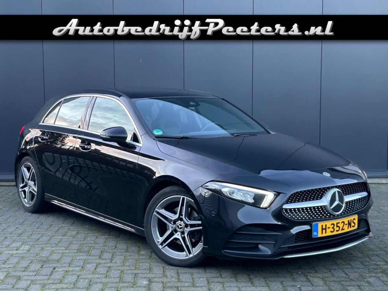 Mercedes-Benz A-klasse - A 180 AMG Line Aut7 Navi LED Camera Carplay Trekhaak - AutoWereld.nl