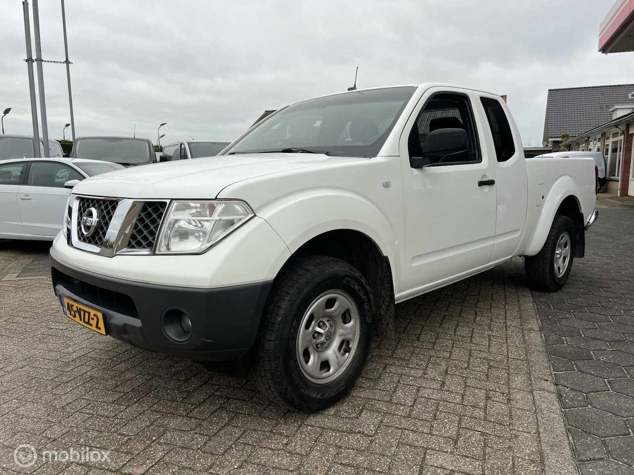 Nissan Navara - 2.5 dCi XE Double Cab 2.5 dCi XE Double Cab - AutoWereld.nl