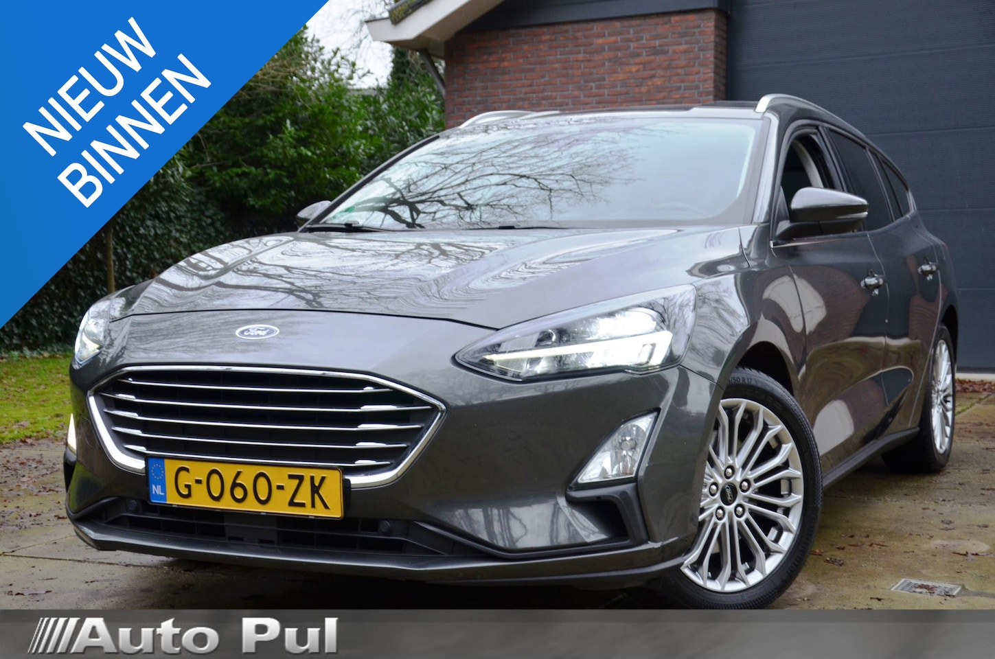 Ford Focus Wagon - 1.0 EcoBoost Titanium Business Navi/Pdc/Ecc/Led/Stoel Stuur & ruitverwarming/Achteruitrijc - AutoWereld.nl