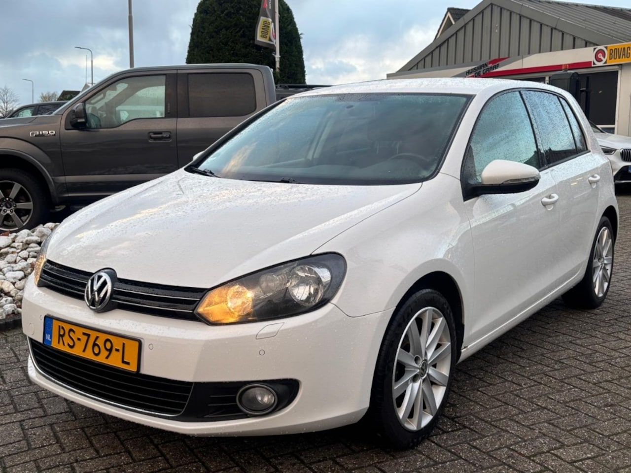 Volkswagen Golf - 1.4 TSI Highline 5-Deurs Wit 2009 Youngtimer - AutoWereld.nl