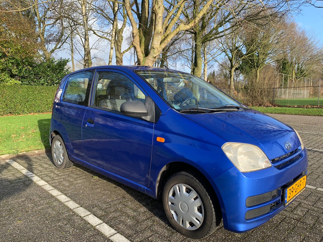 Daihatsu Cuore - 1.0-12V 100th Anniversary - AutoWereld.nl