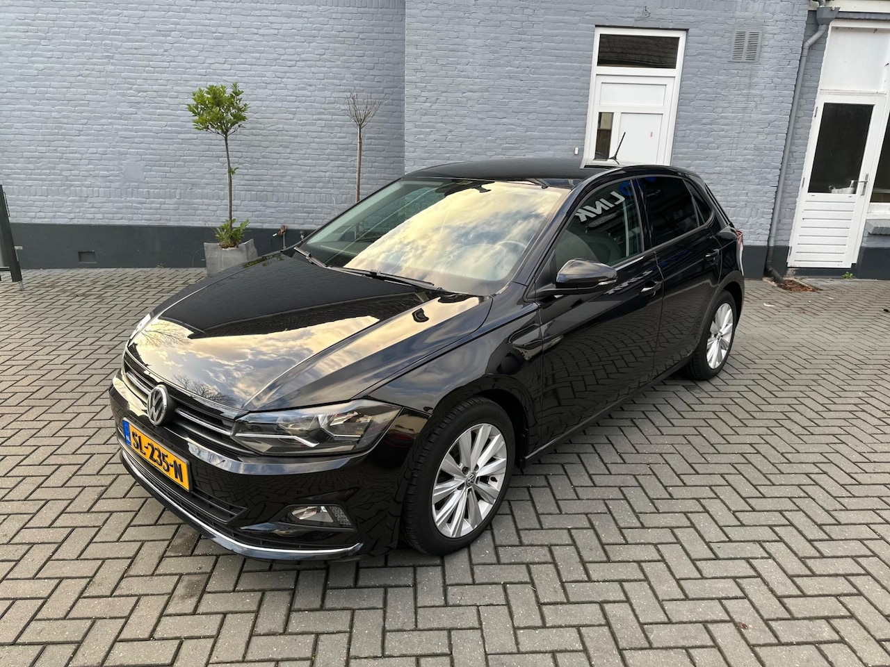 Volkswagen Polo - 1.0 TSI Highline | NAVI | CLIMA | CAMERA | - AutoWereld.nl