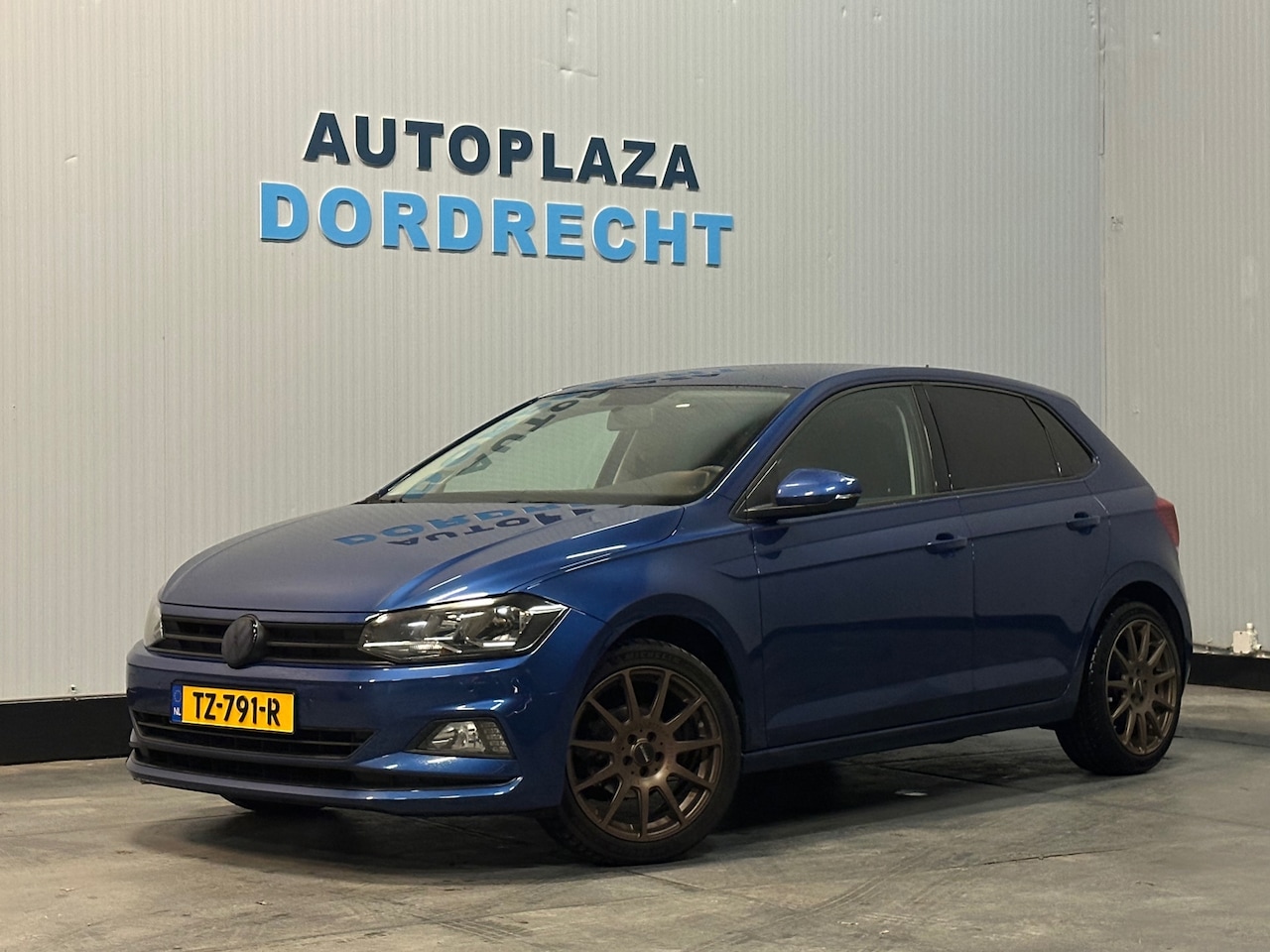 Volkswagen Polo - 1.0 TSI Comfortline PDC I Navi I Adaptive - AutoWereld.nl