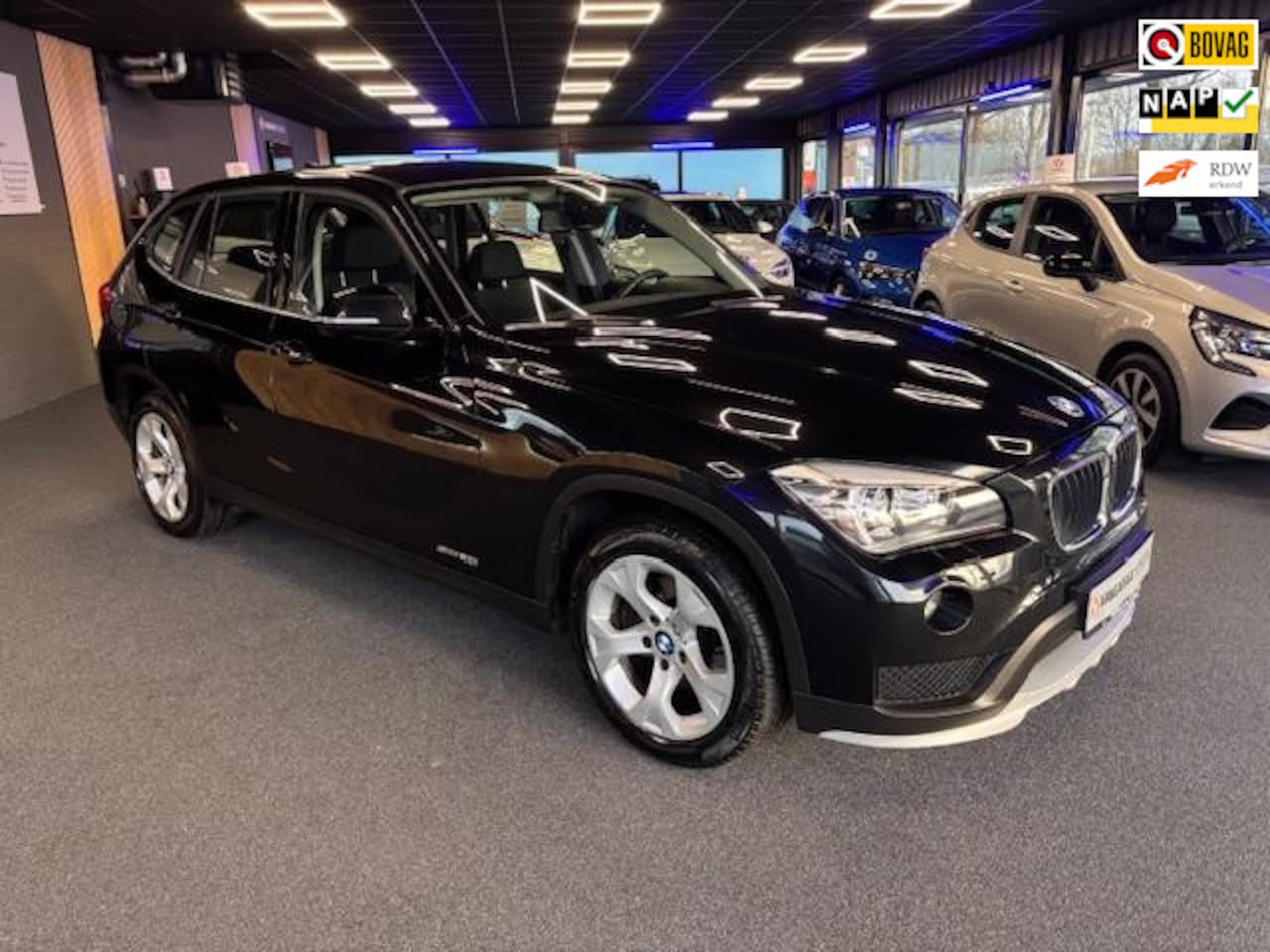 BMW X1 - SDrive20i Executive | Automaat | Clima |Cruise | Navi | Trekhaak Vast | PDC Achter | 2de E - AutoWereld.nl