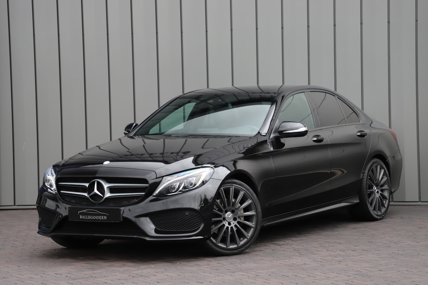 Mercedes-Benz C-klasse - 180 AMG Aut7 | Leder | ILS | Navi | Pdc | NL-auto | 2014. - AutoWereld.nl