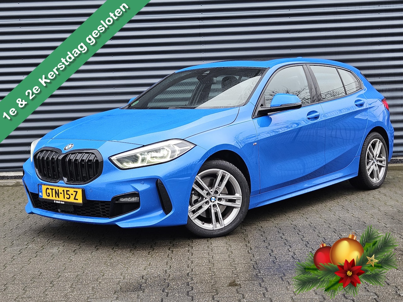 BMW 1-serie - 118i M Sport Dealer O.H Misanoblauw | Panodak | Keyless |  Trekhaak Afn | Camera | Apple C - AutoWereld.nl