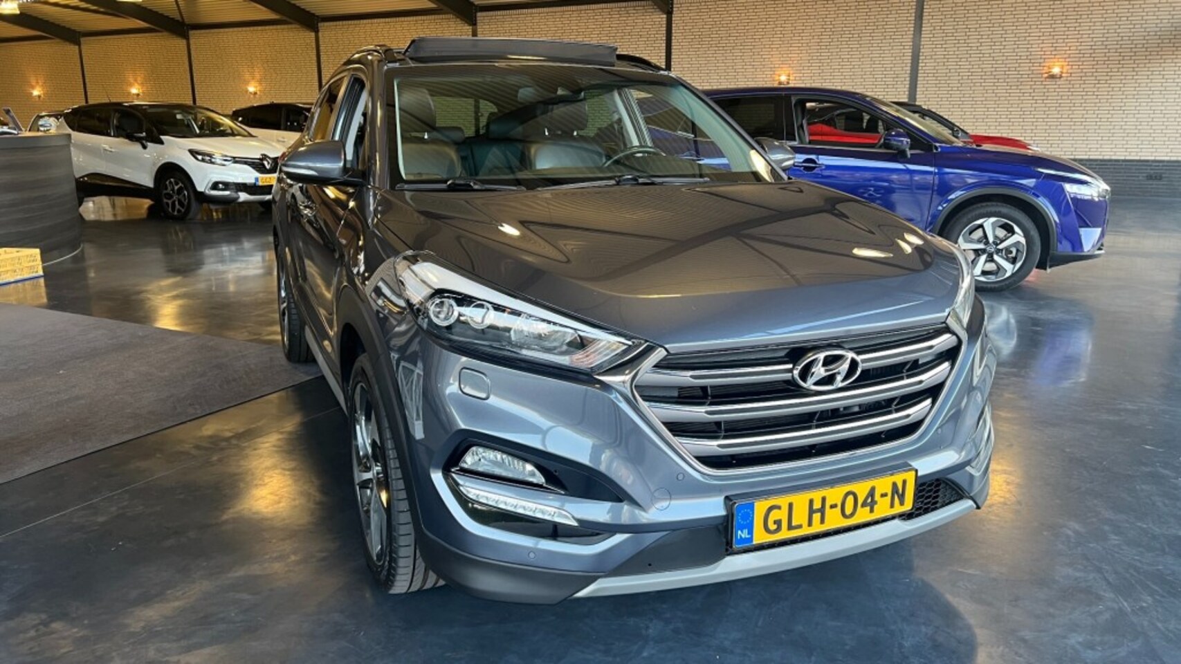 Hyundai Tucson - 1.6 T-GDI Premium 1.6 T-GDI PREMIUM - AutoWereld.nl