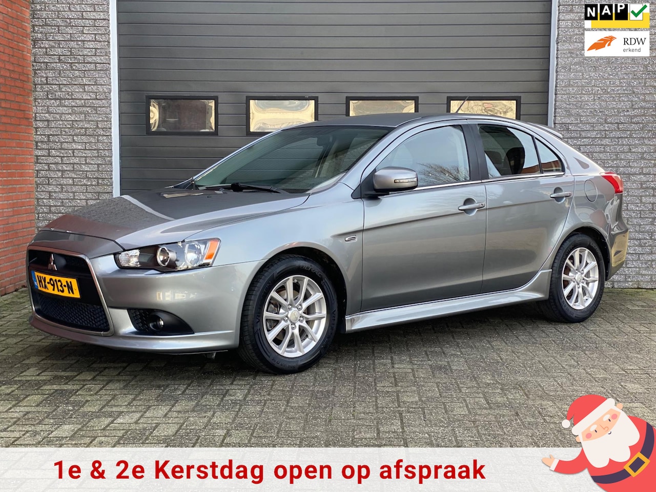 Mitsubishi Lancer Sportback - 1.6 Limited Edition NAVI / AIRCO - AutoWereld.nl