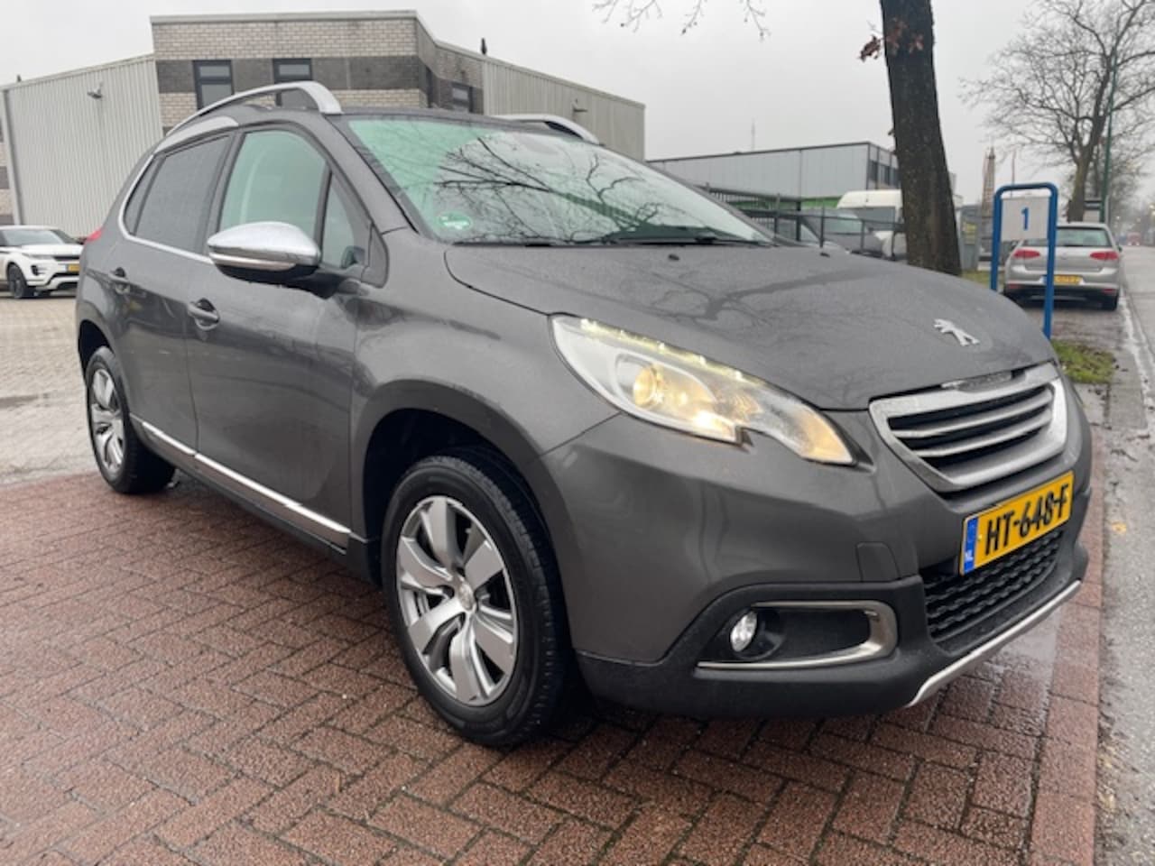 Peugeot 2008 - 1.2 PureTech Allure 129.000km Airco/ECC,Navigatie,Panoramadak - AutoWereld.nl