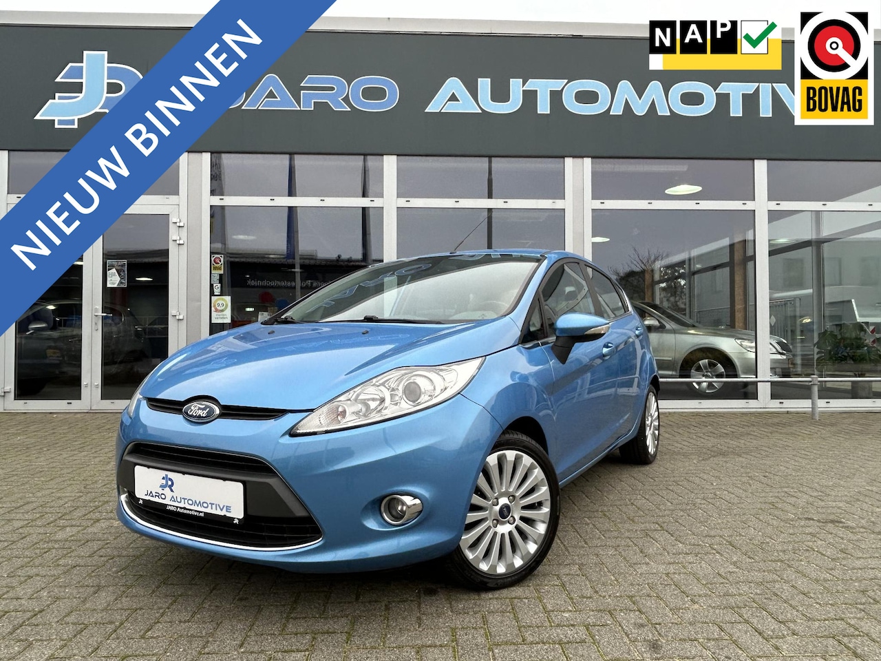 Ford Fiesta - 1.4 Titanium | AUTOMAAT| Vleugelspoiler | Trekhaak | Voorruitverwarming | PDC achter | NAP - AutoWereld.nl