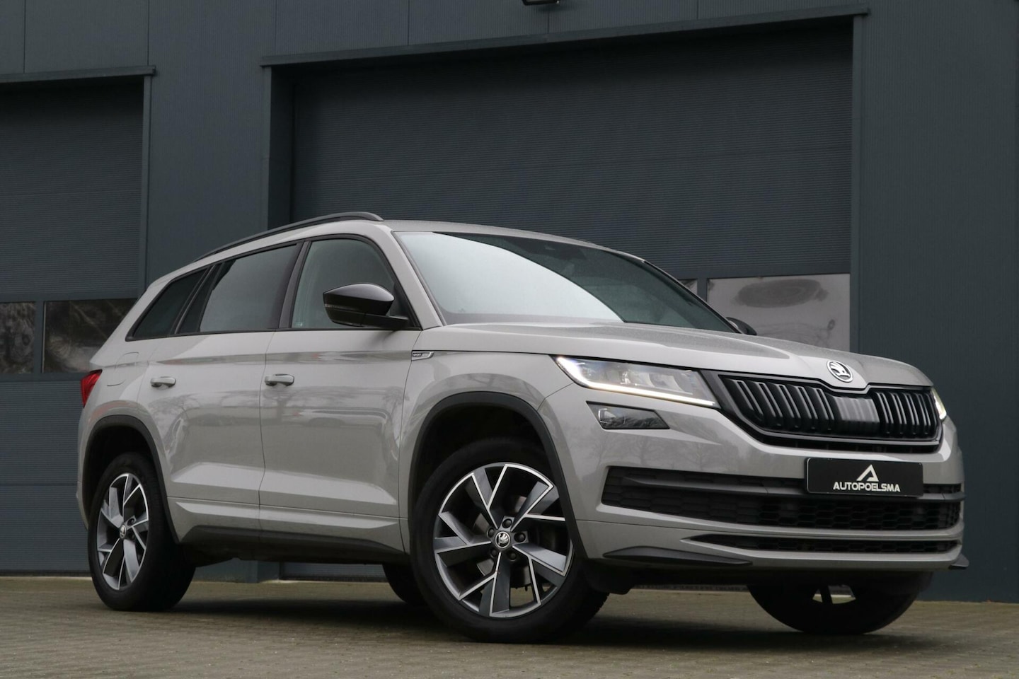 Skoda Kodiaq - 1.5 TSI |SPORTLINE| Adaptiv Cruise Sfeerverlicht Trekhaak Sportzetels SteelGrey Led Memory - AutoWereld.nl