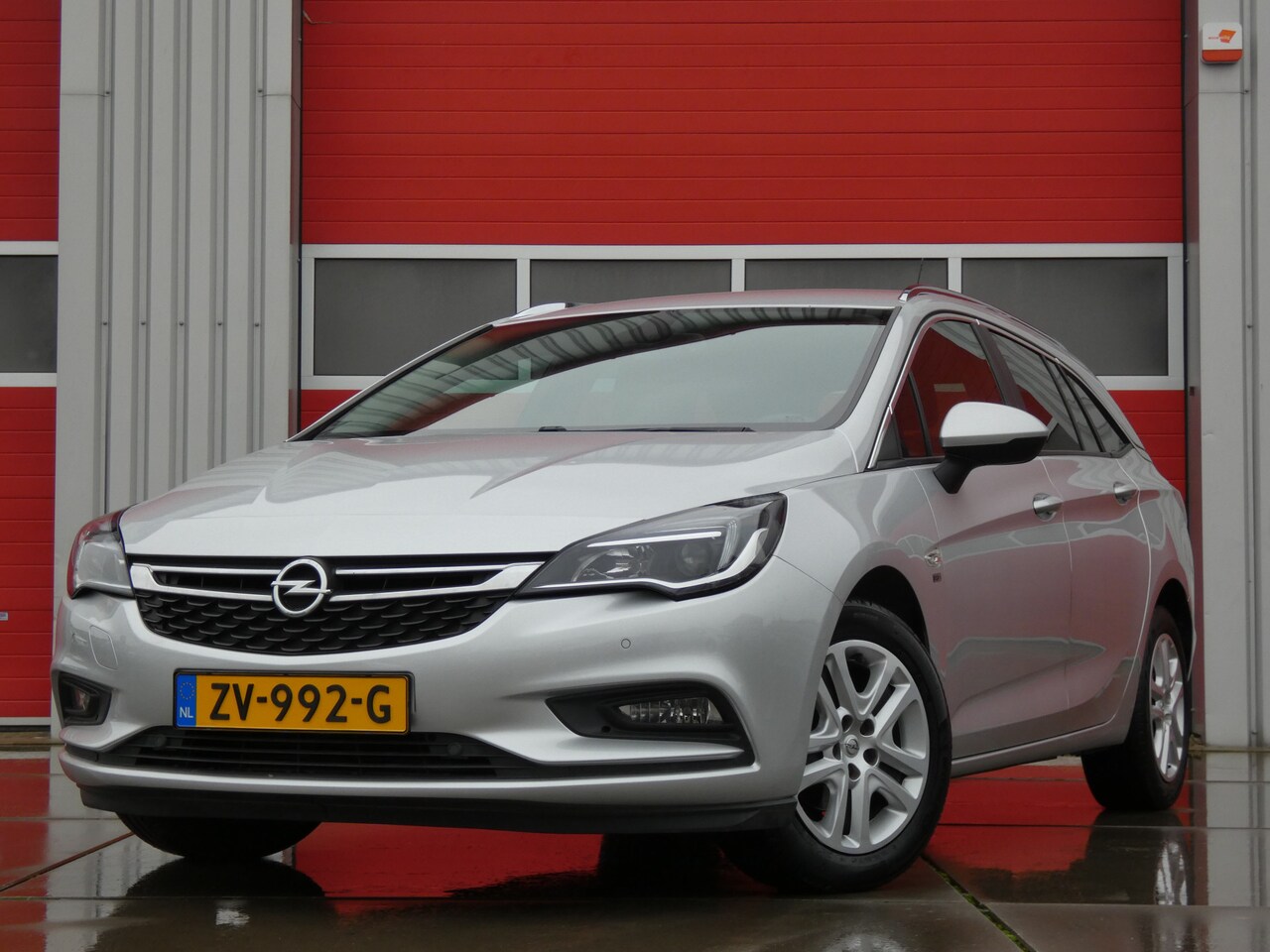 Opel Astra Sports Tourer - 1.0 Turbo 120 Jaar Edition/ zeer mooi! - AutoWereld.nl