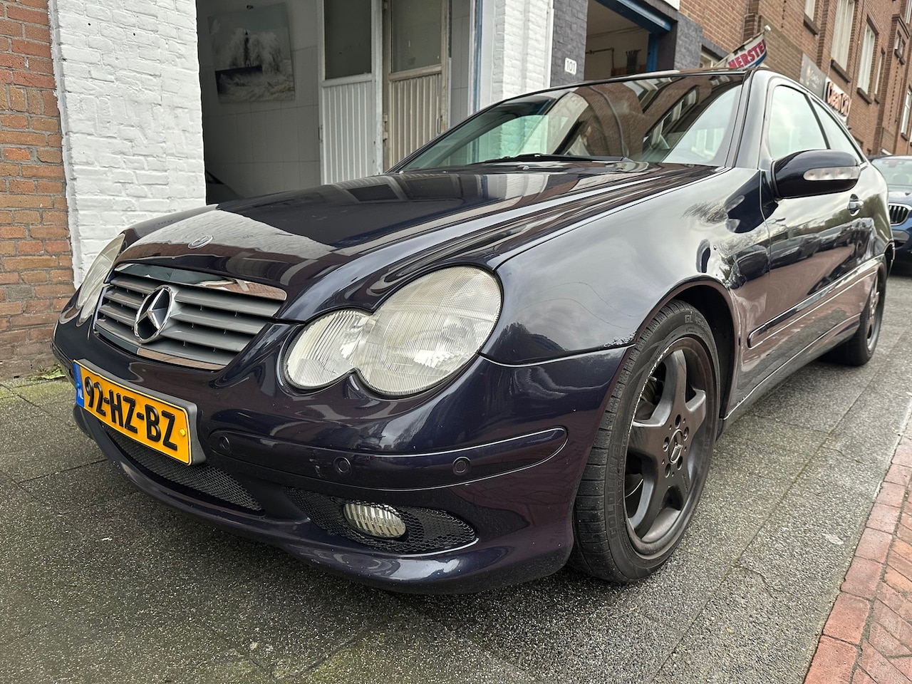 Mercedes-Benz C-klasse Sportcoupé - 200 K. AUTOMAAT Airco Cruise Leer Pano Nette Auto - AutoWereld.nl