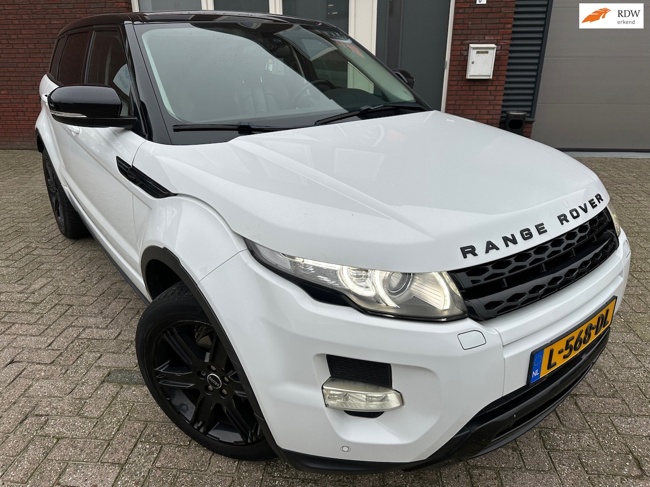 Land Rover Range Rover Evoque - 2.2 TD4 4WD Prestige / Navi / Leder / PDC / Meredian - AutoWereld.nl