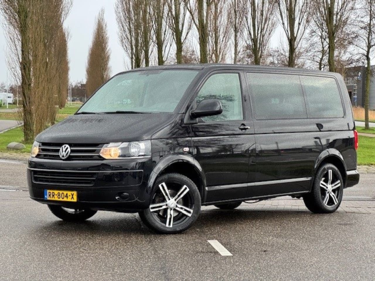 Volkswagen Transporter Kombi - 2.0 TDI L1H1 Comfortline l Caravelle l Airco l Parkeersensoren l Airco l - AutoWereld.nl