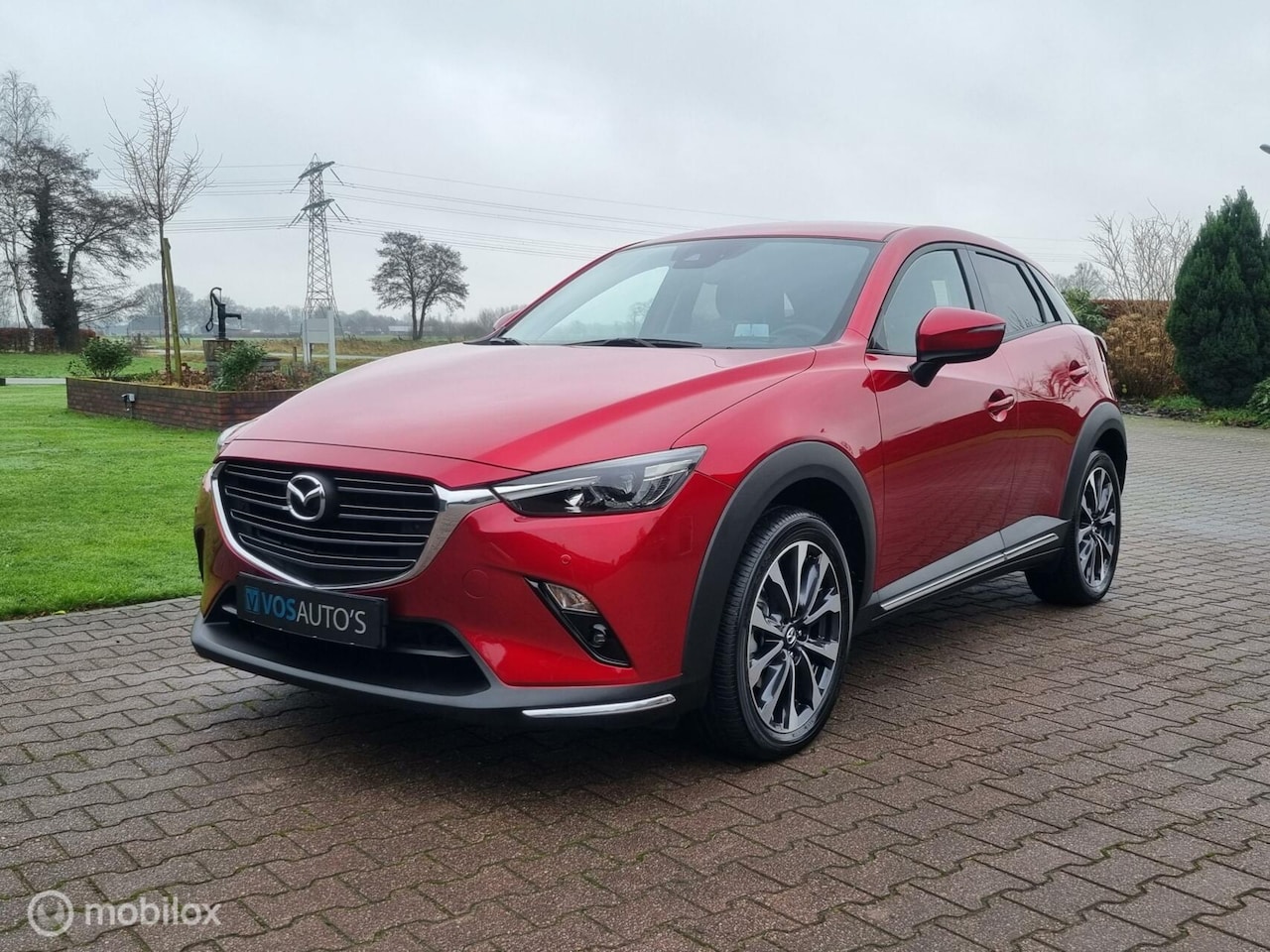 Mazda CX-3 - 2.0 SkyActiv-G 121 Luxury/AUTOMAAT/NAVI/CAMERA - AutoWereld.nl