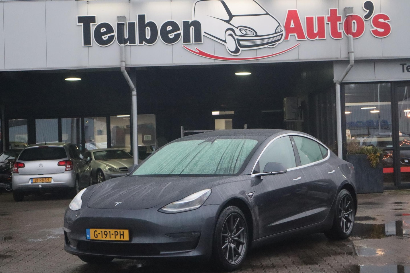 Tesla Model 3 - Long Range RWD Long Range AWD 75 kWh Panoramadak, Stoelverwarming, Trekhaak, Autopilot - AutoWereld.nl