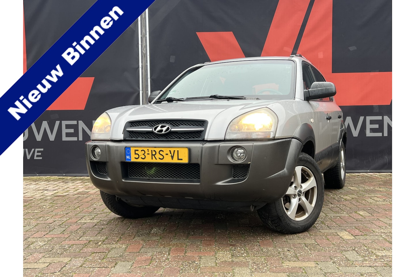 Hyundai Tucson - 2.0i Active | Leest tekst | Read text - AutoWereld.nl