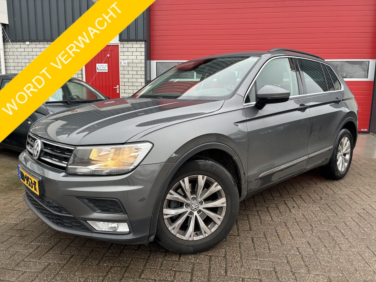 Volkswagen Tiguan - 1.4 TSI ACT Comfortline AUTOMAAT / GR NAVI / CLIMA / PDC / BLUETOOTH / CRUISE / NL-AUTO - AutoWereld.nl