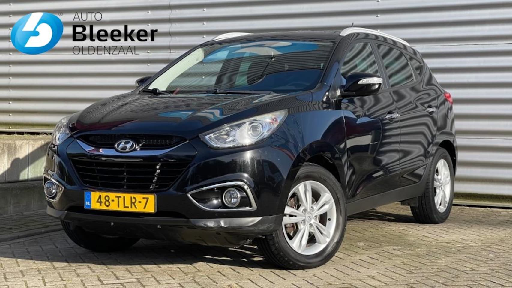 Hyundai ix35 - 2.0I 4WD Style Automaat Airco Cruise Navi Trekhaak - AutoWereld.nl