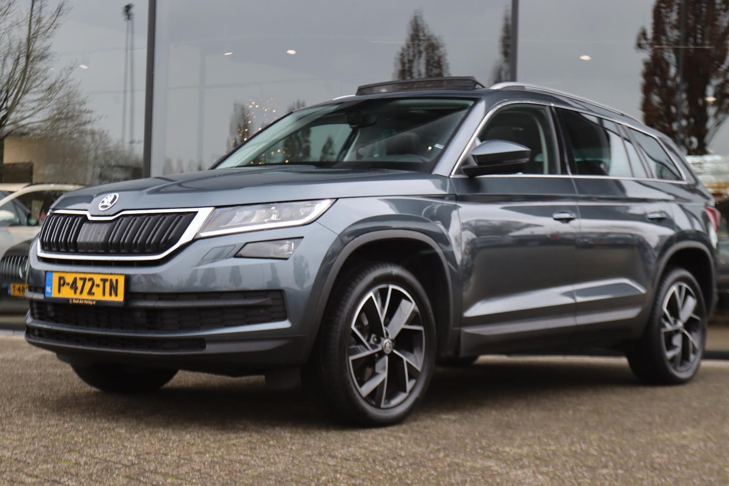 Skoda Kodiaq - 1.5 TSI AUT. SPORTLINE BUSINESS | PANO | ADAP. CRUISE | CLIMATE | CARPLAY | STOELVERW. | K - AutoWereld.nl