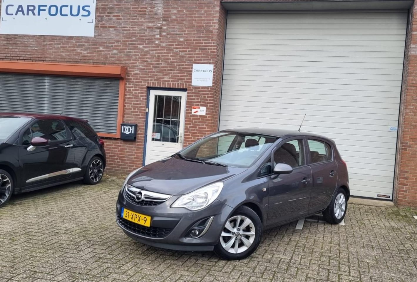 Opel Corsa - 1.2-16V Anniversary Edition Cruise 2e eigenaar APK Leder Airco NAP - AutoWereld.nl