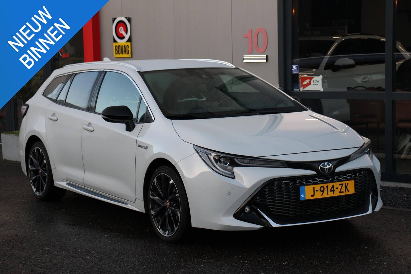 Toyota Corolla Touring Sports - 2.0 Hybrid Business GR-Sport 87DKM, Head-UP, TREKHAAK - AutoWereld.nl