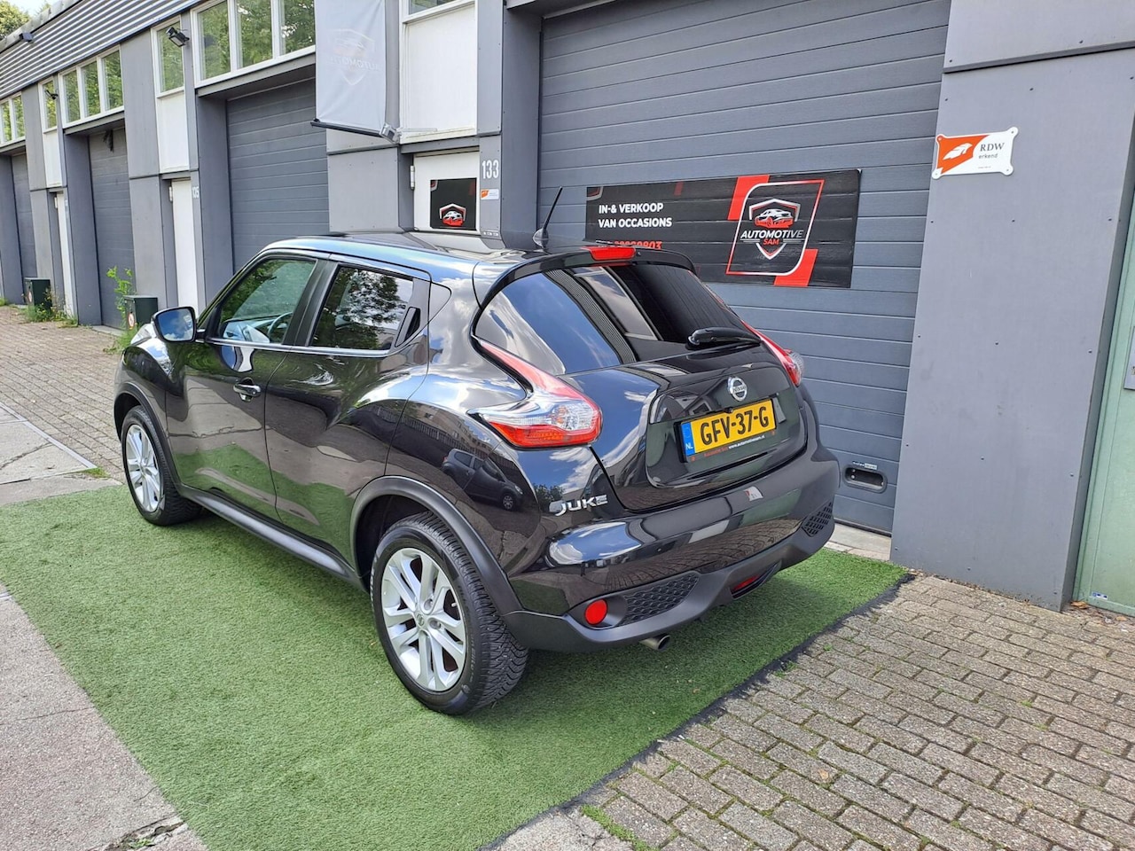 Nissan Juke - 1.6 Acenta Automaat Navigatie Camera Cruis Clima - AutoWereld.nl