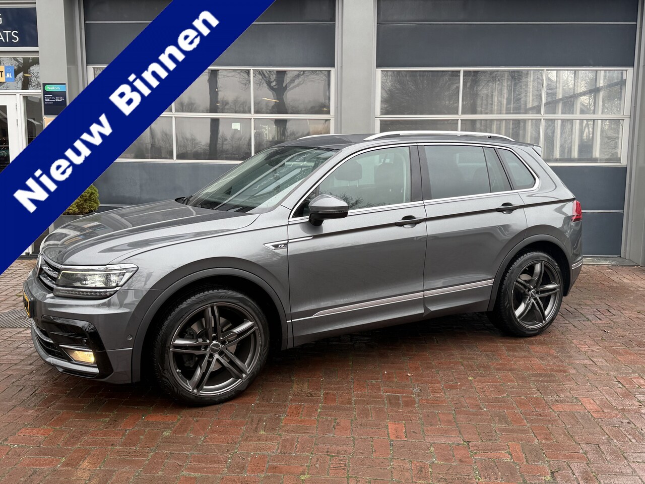 Volkswagen Tiguan - 2.0 TSI 4Motion Highline Business R Automaat,Leer,Trekhaak,Navi 4x4 Bj 2018 Km 91.147 Unie - AutoWereld.nl