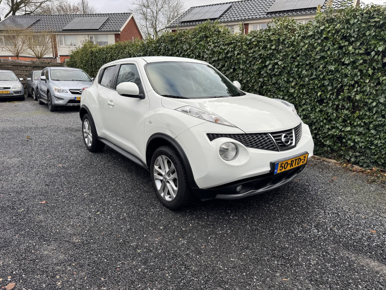 Nissan Juke - 1.6 Acenta | Navi | Autom. Airco | Camera | Cruise Control | LMV | Privacy Glass | APK tot - AutoWereld.nl