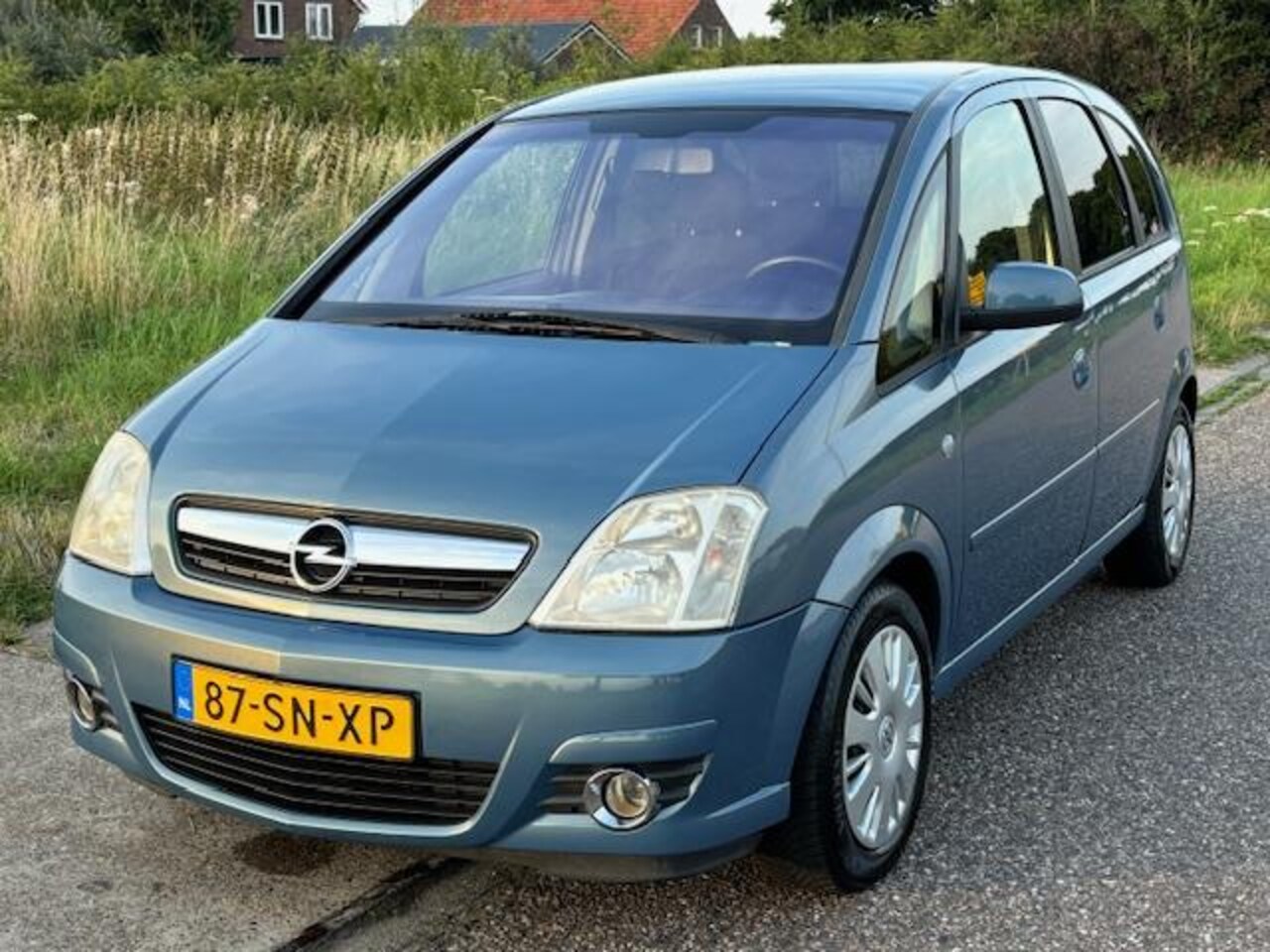 Opel Meriva - 1.6-16V Cosmo ECC Electric pakket Audio-CD/MP3 Colorpakket ABS Afneembare trekhaak Dealero - AutoWereld.nl