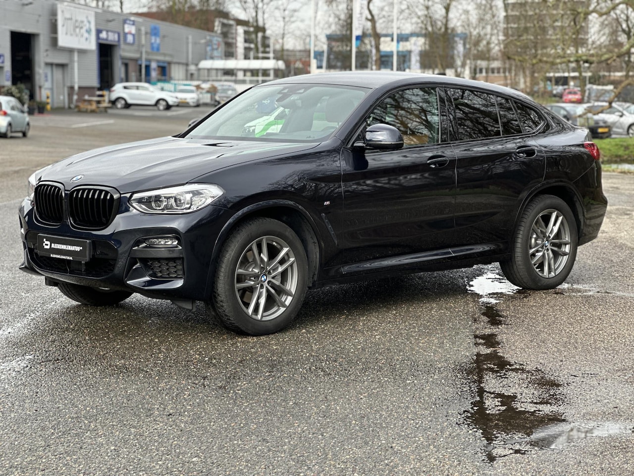 BMW X4 - xDrive20i High Executive M-sport - AutoWereld.nl