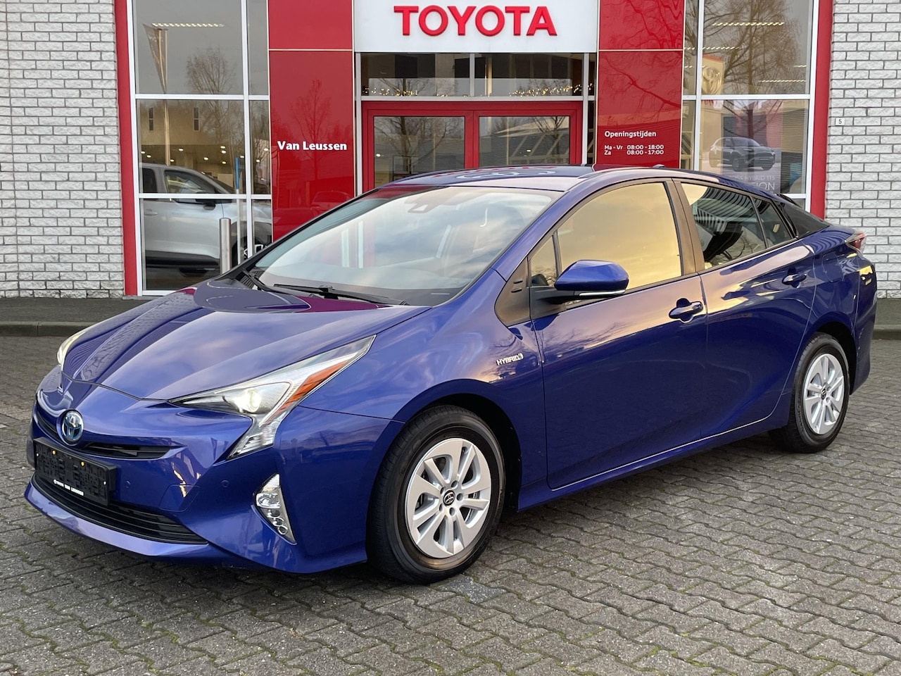 Toyota Prius - 1.8 HYBRID ASPIRATION PARK-SENSOREN KEYLESS CLIMA AD-CRUISE CAMERA - AutoWereld.nl