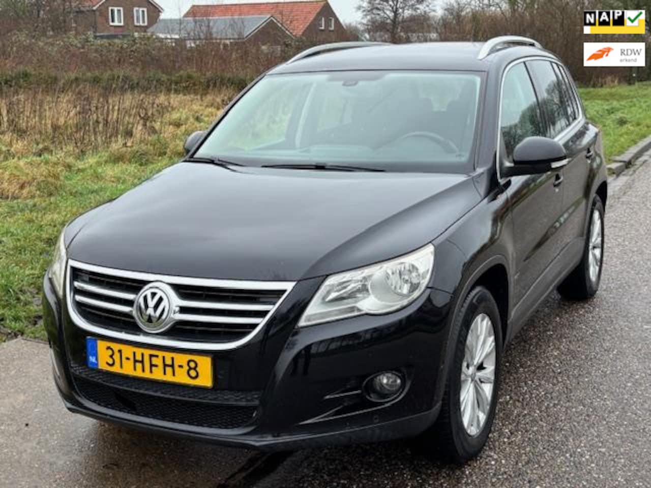 Volkswagen Tiguan - 2.0 TSI Sport&Style 4Motion ECC Audio/CD Navigsatie Electr. pakket LMV 17" Cruisecontrol D - AutoWereld.nl