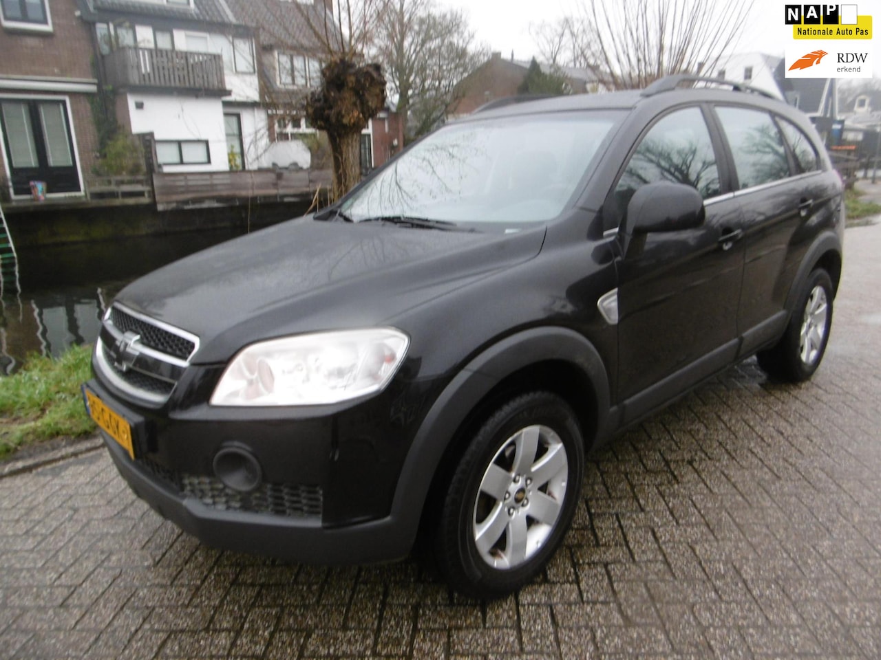 Chevrolet Captiva - 2.4i Style 2WD 7-Persoons 2e eig. Trekhaak 1500kg Airco - AutoWereld.nl