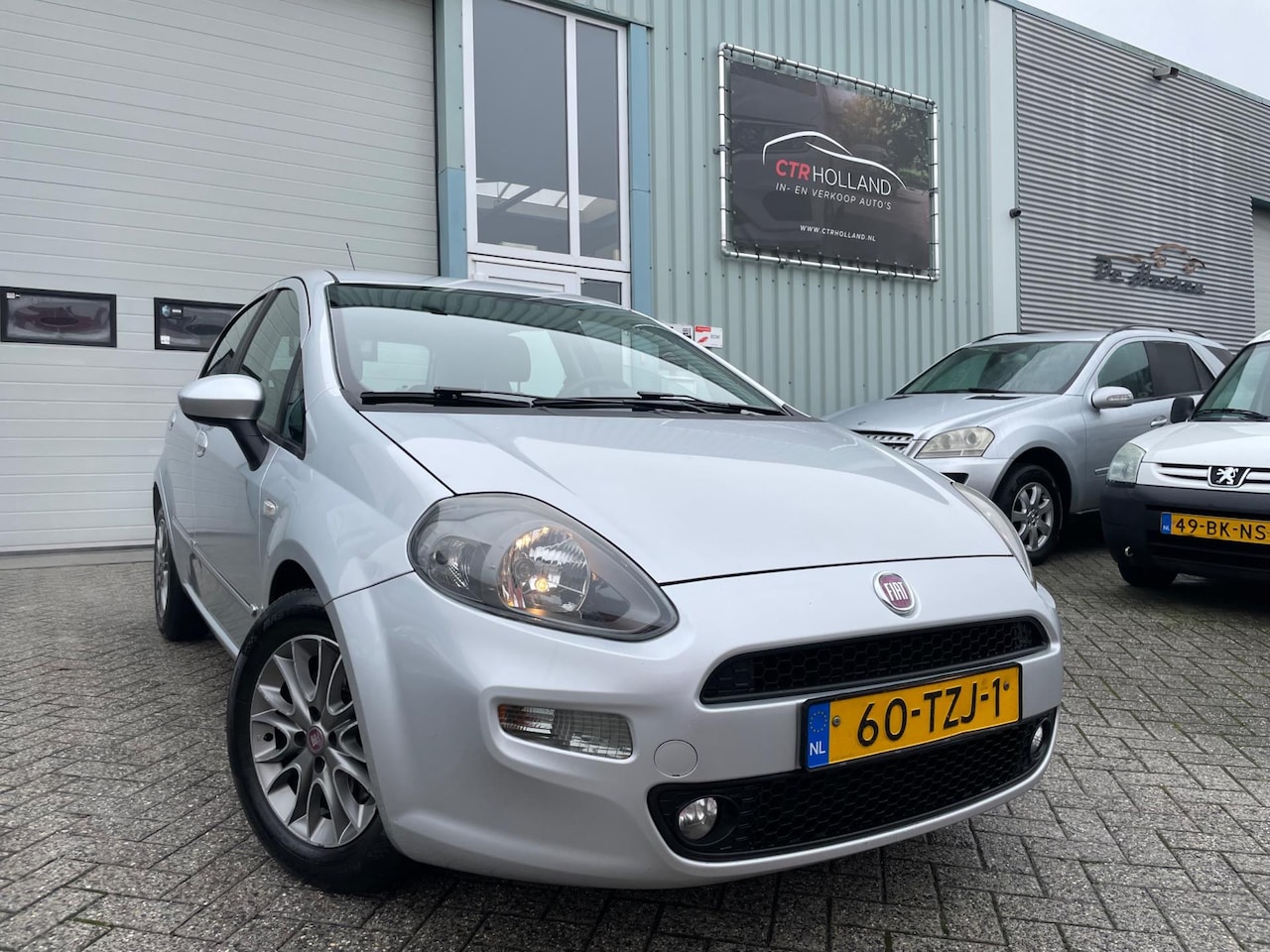 Fiat Punto Evo - 1.3 M-Jet Easy 5D (bj 2012) Climate control|Cruise control! - AutoWereld.nl