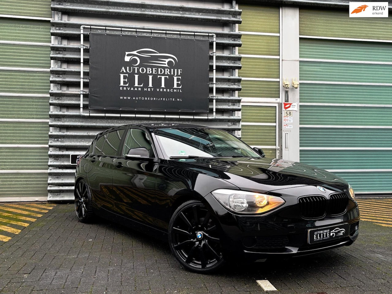 BMW 1-serie - 114i EDE Business All Black - AutoWereld.nl