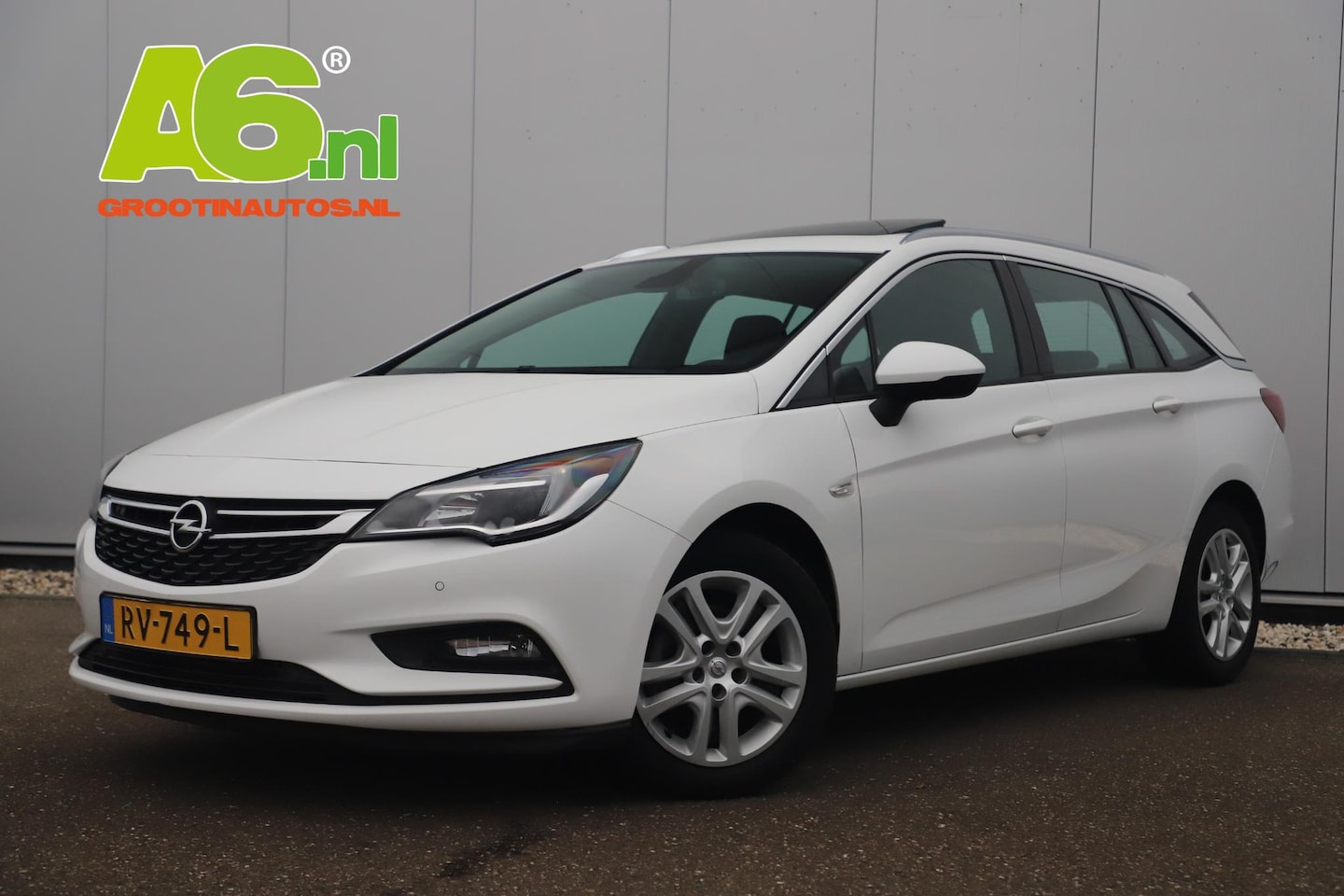 Opel Astra Sports Tourer - 1.0 Business+ Schuifdak Navigatie Clima Cruise Sportstoelen Parkeersensor Carplay Android - AutoWereld.nl