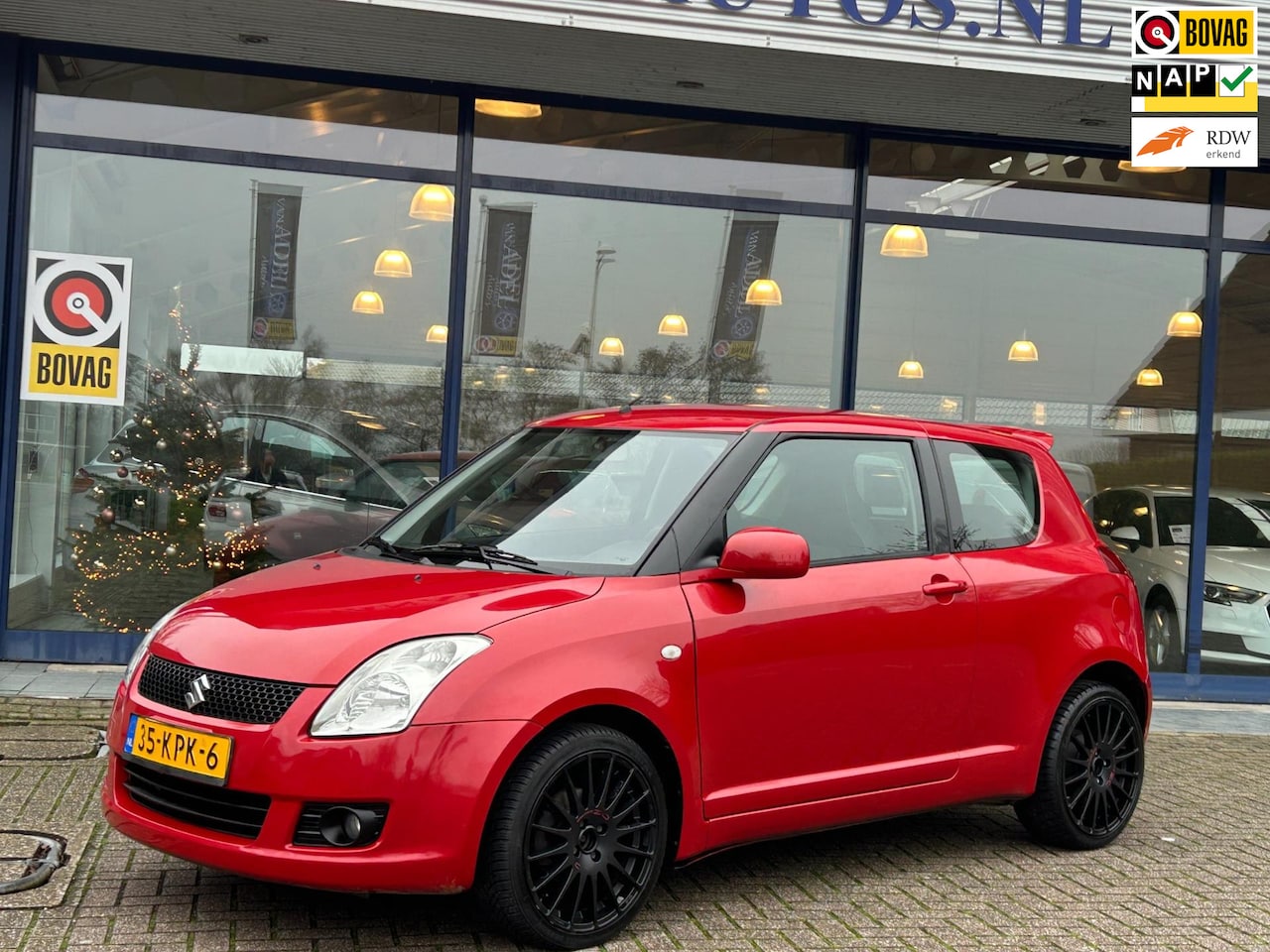 Suzuki Swift - 1.3 Bandit Airco LM-Velgen Keyless-Entry Sportstoelen Dakspoiler NAP NL-Auto NIeuwe APK! - AutoWereld.nl