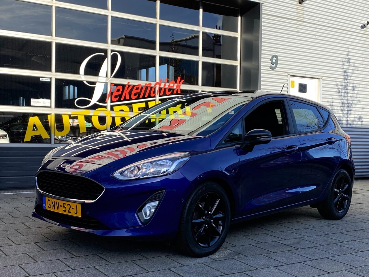 Ford Fiesta - 1.0 EcoBoost Cool - Navigatie / Apple CarPlay I Airco I Veiligheids pakket I Sport velgen - AutoWereld.nl