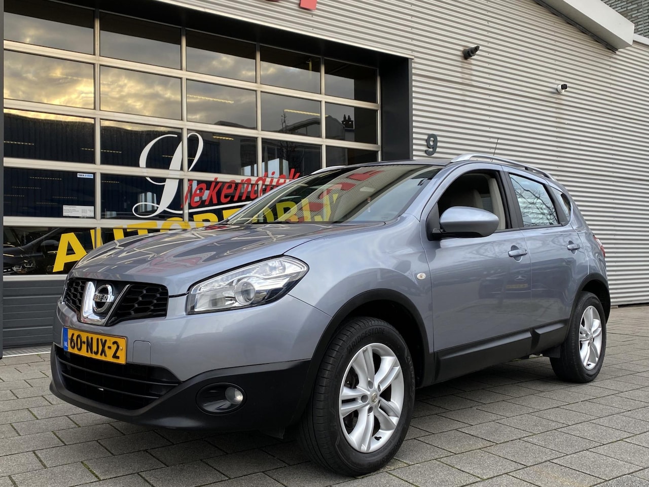 Nissan Qashqai - 1.6 Acenta - Navigatie / Apple CarPlay I Airco I Sport velgen I Comfort pakket I APK 09-20 - AutoWereld.nl