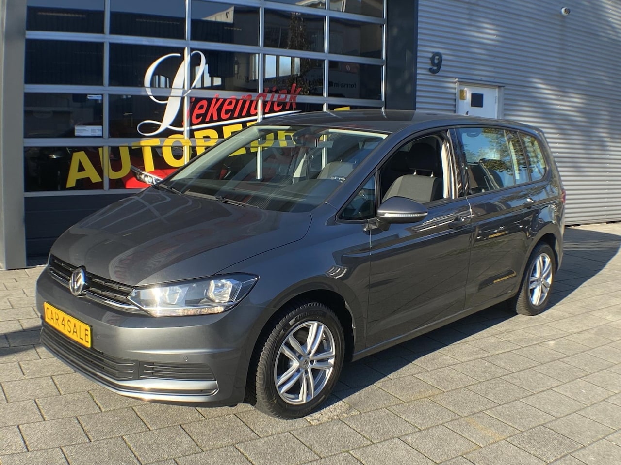 Volkswagen Touran - 1.2TSi Trendline BlueMotion Tech - Navigatie I Airco I PDC I Sport velgen I Comfort pakket - AutoWereld.nl