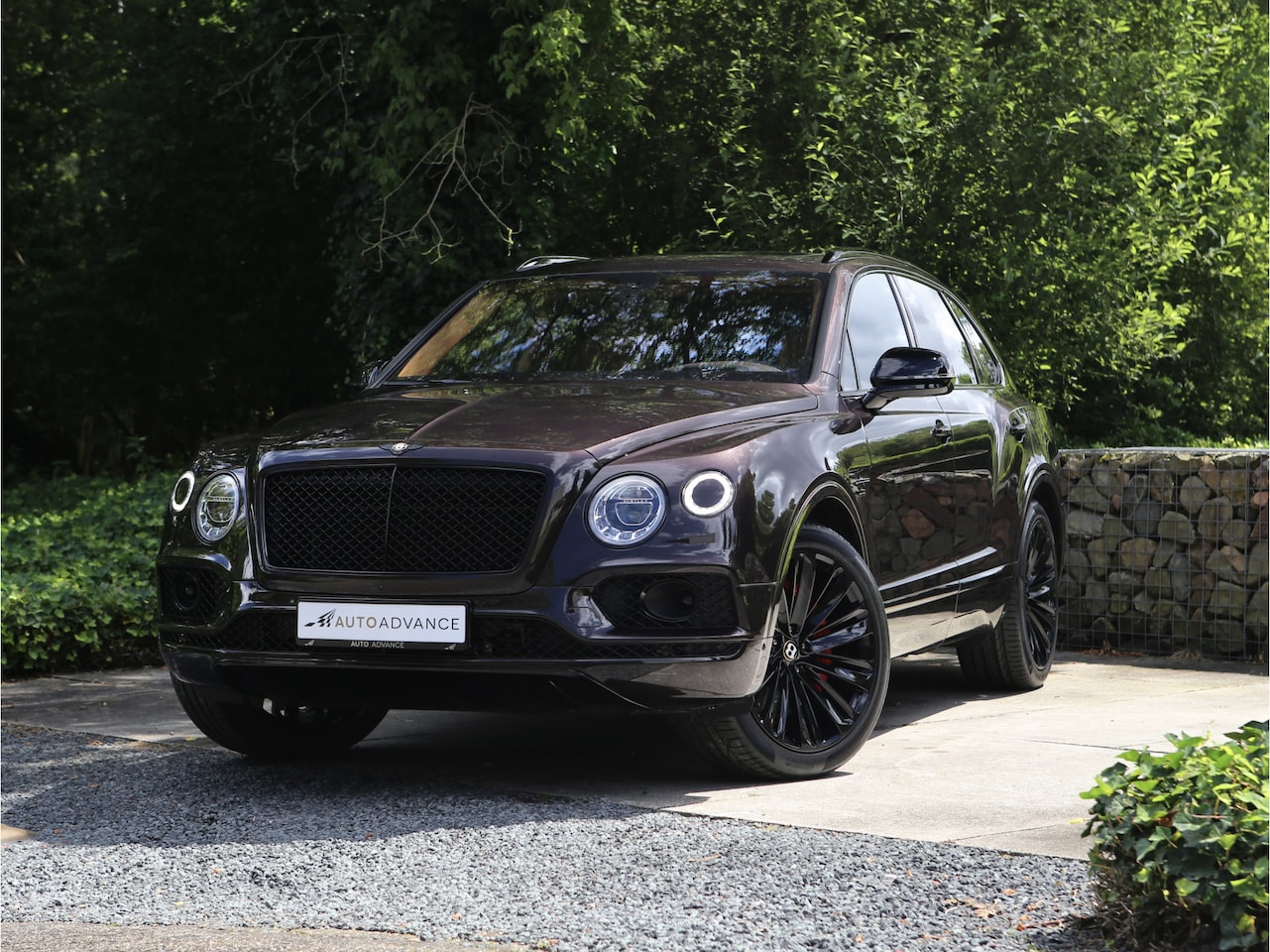 Bentley Bentayga - Hybrid Mulliner Centenary Edition - AutoWereld.nl